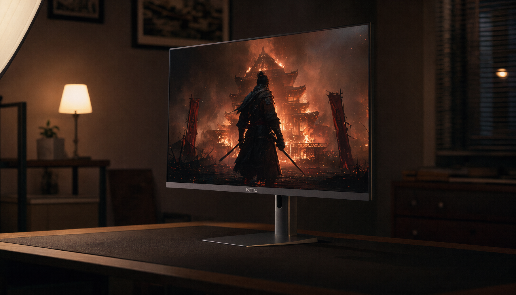 Gaming monitor displaying deep black cinematic content on a dim desk, illustrating real-world contrast performance