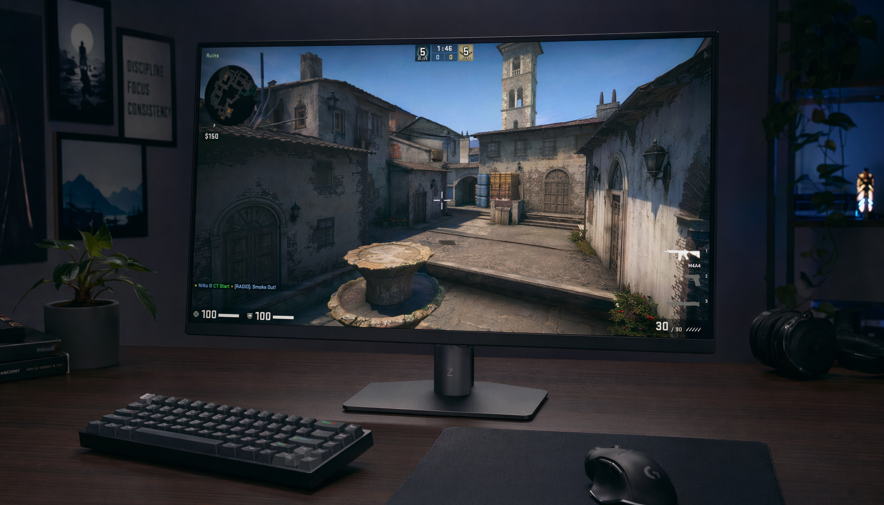 Matte gaming monitor on a competitive desk displaying a tactical FPS game under soft overhead lighting with no glare