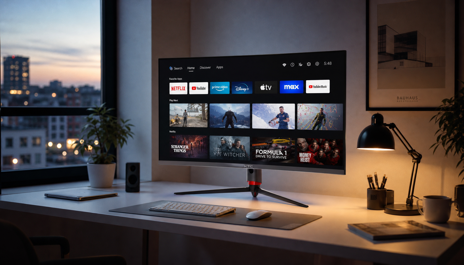 Smart monitor displaying a streaming app store interface on a home office desk