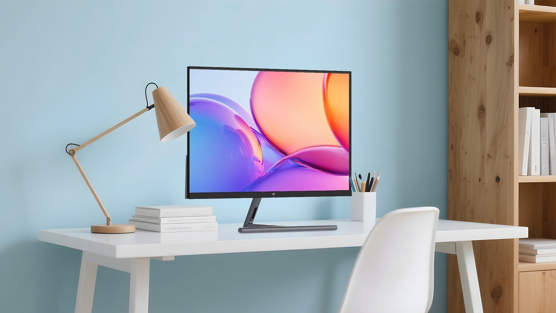 Modern computer monitor on a minimalist white desk with a wooden lamp and light blue wall, creating an efficient and comfortable home office setup.